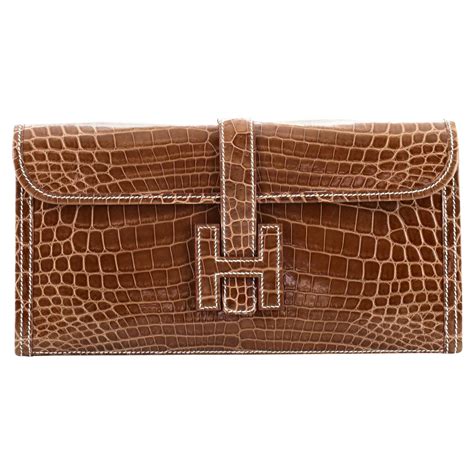 hermes jige crocodile clutch price|authentic Hermes clutch.